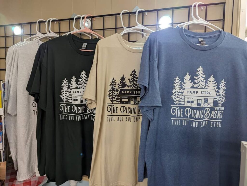 hanging shirts with camp store logo